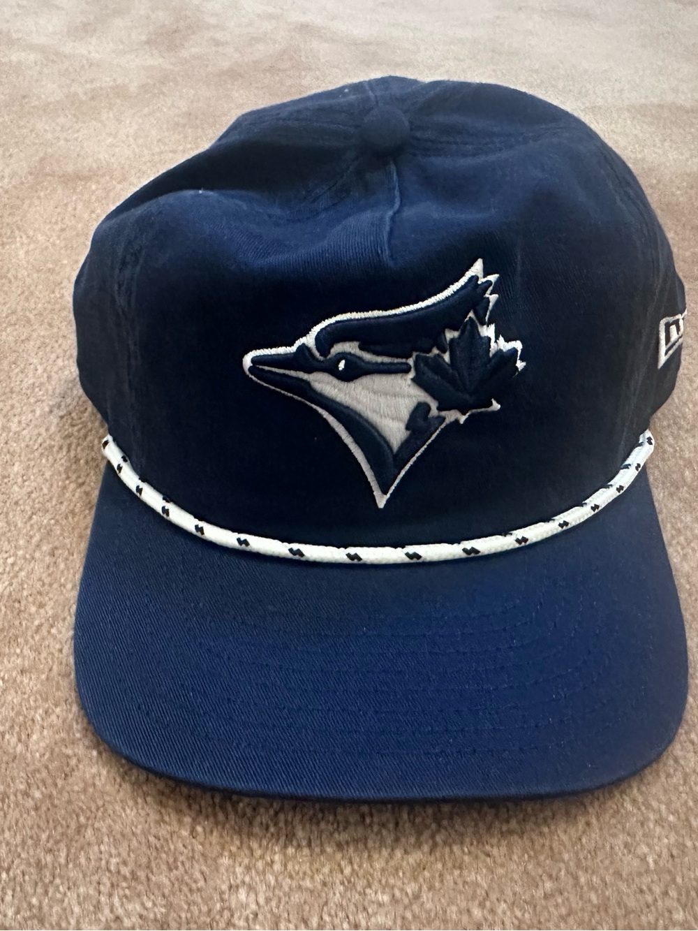 Toronto Blue Jays New Era 19TWENTY adjustable rope hat in navy blue.
